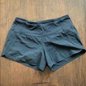 Black Lululemon running shorts, size 6